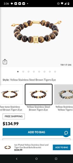 Yellow stainless steel tiger eye bracelet $100 or (OBO!)