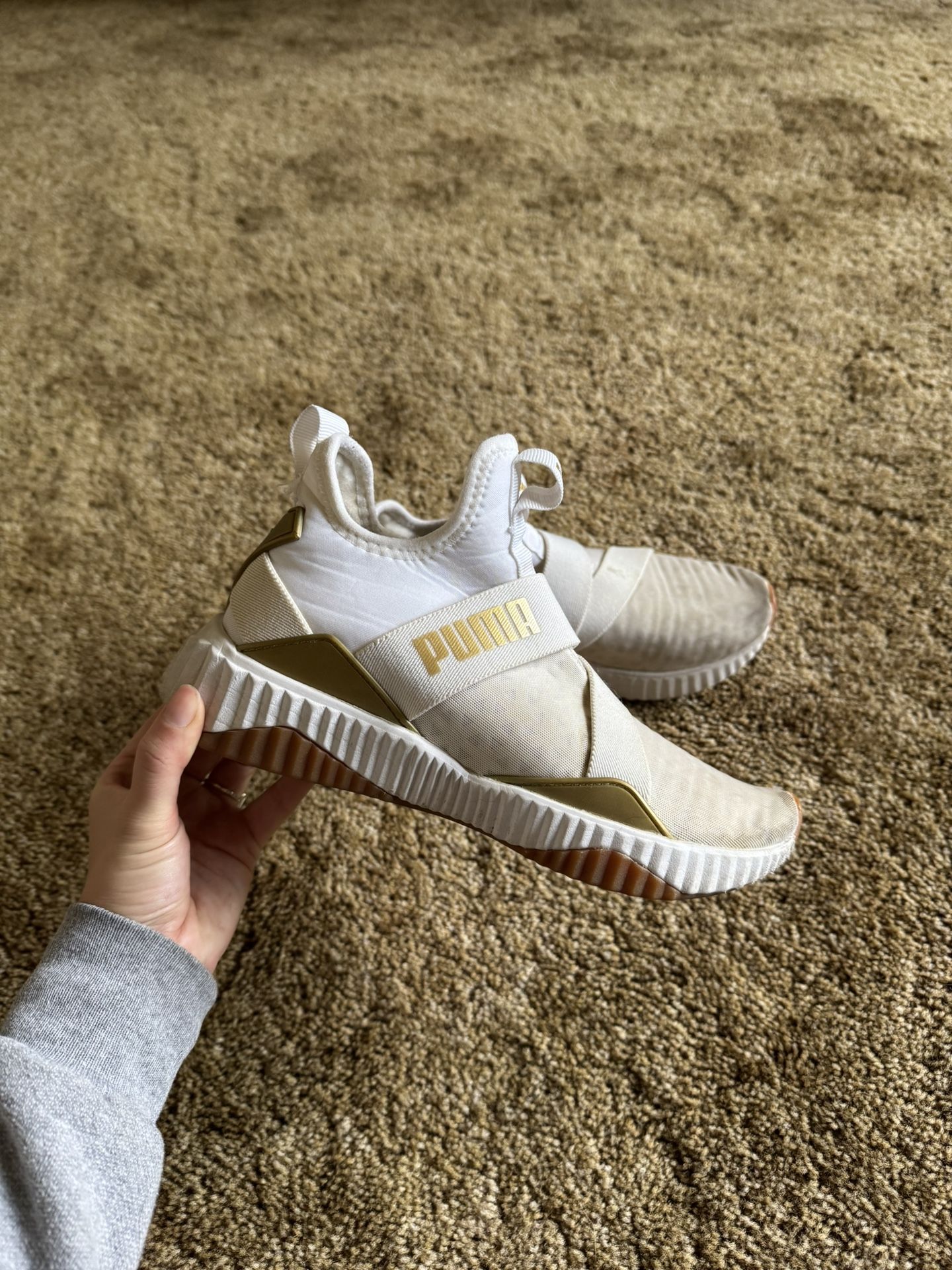 White and gold Puma athletic, slip on shoes; excellent condition, just need a deep clean