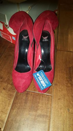 Red new heels size 8