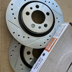 Volkswagen Golf 99-06 Front Drill Slot Rotors Ceramic Brake Pads 