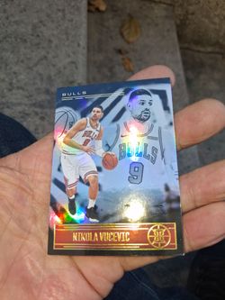 2020-21 Panini Illusions Nikola Vucevic #13 - Chicago Bulls Rainbow Foil. Near Mint Condition