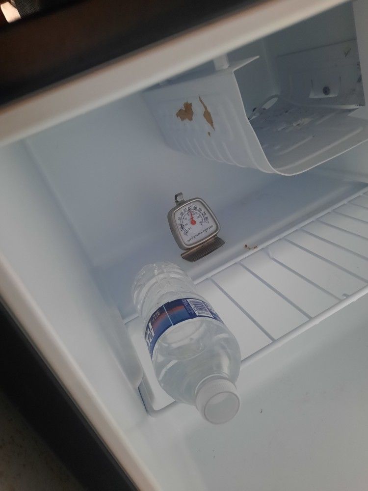 apartment size fridges needs cleaning