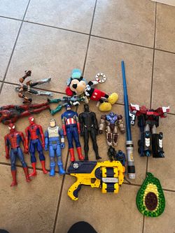 Mixed lot of marvel action figures, light sabre toys