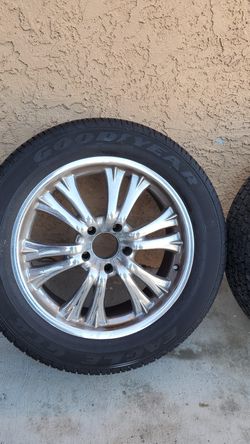 4 20 inch Chrome rims and Goodear tires.