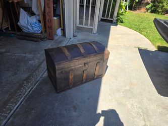 Antique round top Steamer Trunk