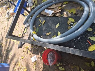 15 feet of 2 inch, metallic liquidite.