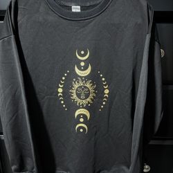 New. Women’s Size Large Sun and Moon Graphic Crew Neck Sweatshirt