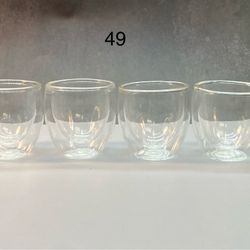 Set of (4) beautiful glass cups ideal for tea, sake, vodka shots or other hot drinks or liquors. They make aesthetic contemporary minimalist style hol