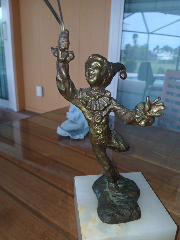 Bronze Clown Holding Orange Lucite Balloons