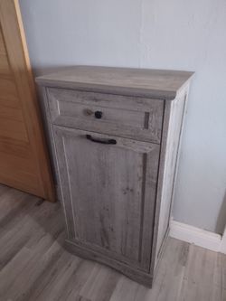 Brand new Ashley wood organizer 38x21x14 Heavy duty. Perfect for tall trash can.