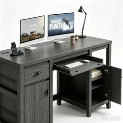 Farmhouse-style computer desk. Comes with a pull-out keyboard tray, drawers, in dark gray, 58"W × 22"D × 29.5"H