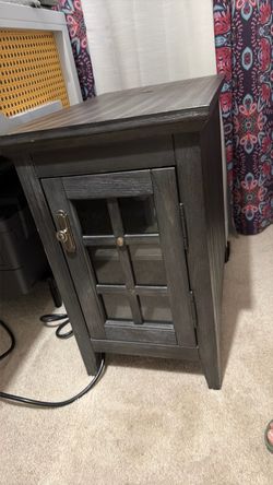 Gray end table with outlets