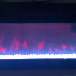 Fire Place 31 Inches Long 16 1/2 Inches Tall Color Changing  And Heater 
