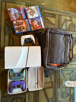PS 5 + controllers/ games/ cases/ charger