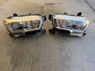 2016-2023 Toyota Tacoma OEM Headlights Pair Left & Right