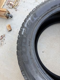 two 19 inch Cooper tires