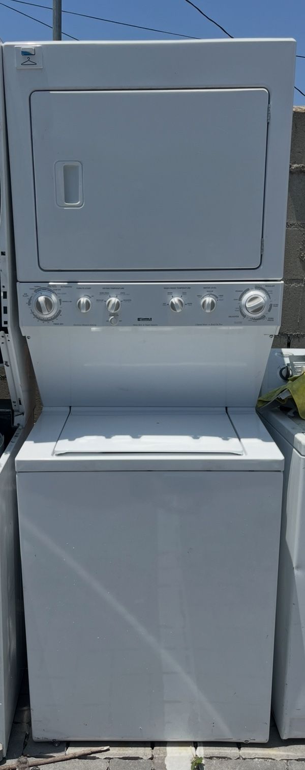 stacked Kenmore Gas Washer and Dryer