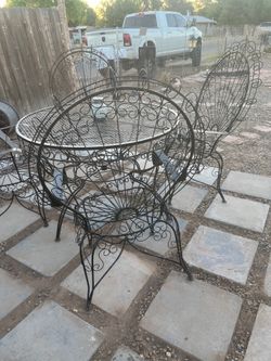 Vintage wrought iron, peacock table and chairs with hanging swing