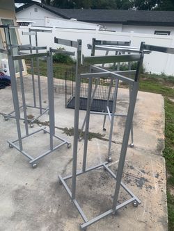 4 CLOTHES RACKS  w wheels $50 each