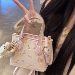 Pink bucket bag women‘s 2025 new high-end atmosphere small high-class light luxury super hot niche cross-body bag