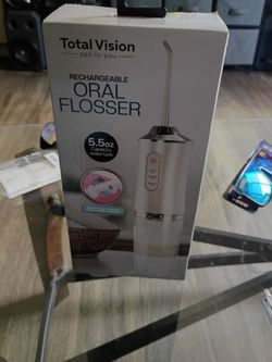 Total vision rechargeable ORAL FLOSSER