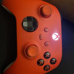 Red/black Xbox Controller.