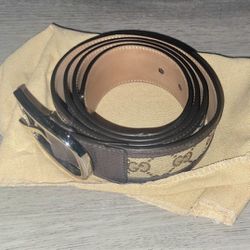Gucci GG Canvas & Leather Belt features a Brown Calfskin body in size 110-44  