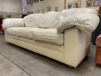 HANCOCK & MOORE Vintage Ivory Leather 3 Seat Sofa with Pipping Detail and on Casters