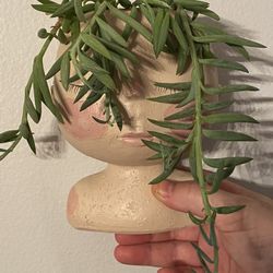 String Of Bananas On Woman’s Head