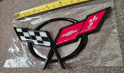 One 1997' to 2004' Corvette badge adhesive back Choose Color.  See all 12 pix sold separate. SHIPPING AVAILABLE