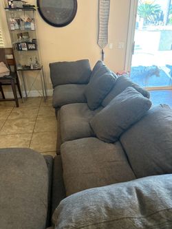 Gray sofa and ottoman