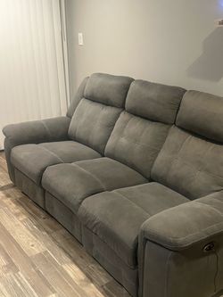 Power reclining sofa and love seat