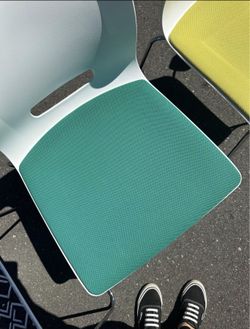 Green Senator stacking chairs