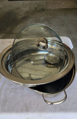 Stainless steel serving bowl with the glass lid