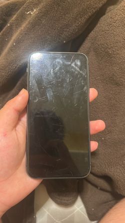 Apple iPhone with Heavily Scratched Screen