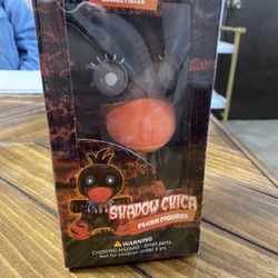 The image shows a Phantom Chica plush toy, a collectible item from the Five Nights at Freddy's video game series