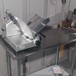 Slicer And Stainless Steel Table