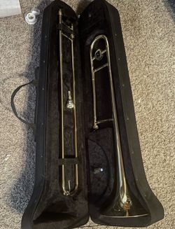 2 antique trumpets