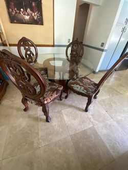 Four seat glass dinning table