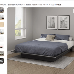 Queen bed frame still in  box