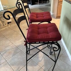 4 Black iron Bar Stools With Cushions. Will Separate!