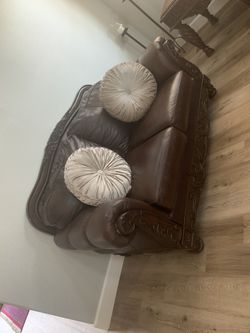 Barely used leather couch set with tables!