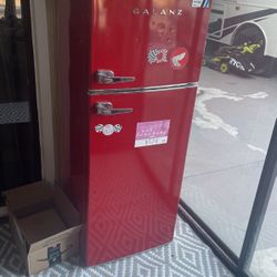 Small mini fridge with freezer old-school looking