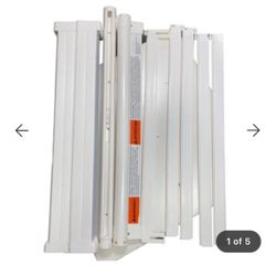 BabyDan Guard Me Safety Gate  stands 28” tall fitting doorways from 21.7” to 35.2” wide.