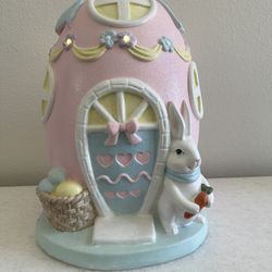 Light Up Pastel Pink Easter Egg House With Blue Ribbon Bow On Top