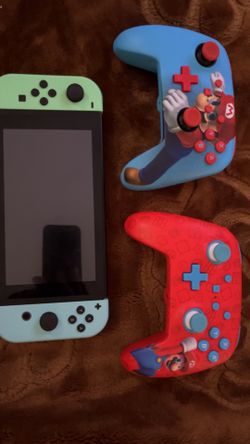 Nintendo switch with Mario remotes🥹