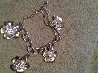 Silver costume jewelry charm bracelet