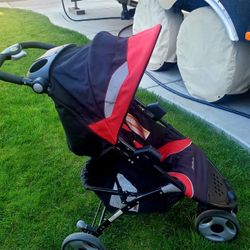 Eddie BUAER STROLLER....RED / BLACK COLOR..FOLDS DOwn
