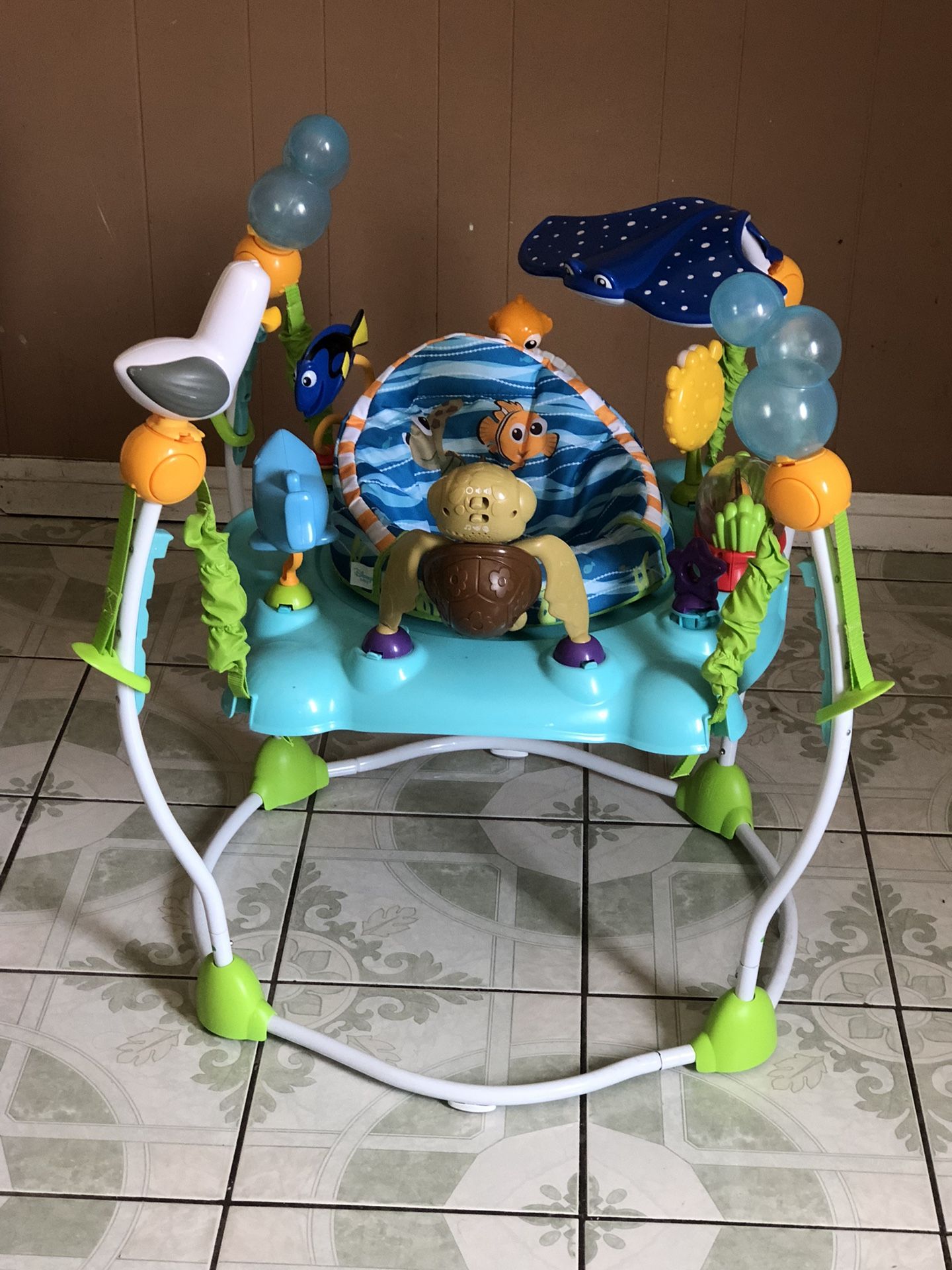 BRAND NEW FINDING NEMO BABY ACTIVITY JUMPER MUSIC LIGHTS AND SONGS WORKS!!!!