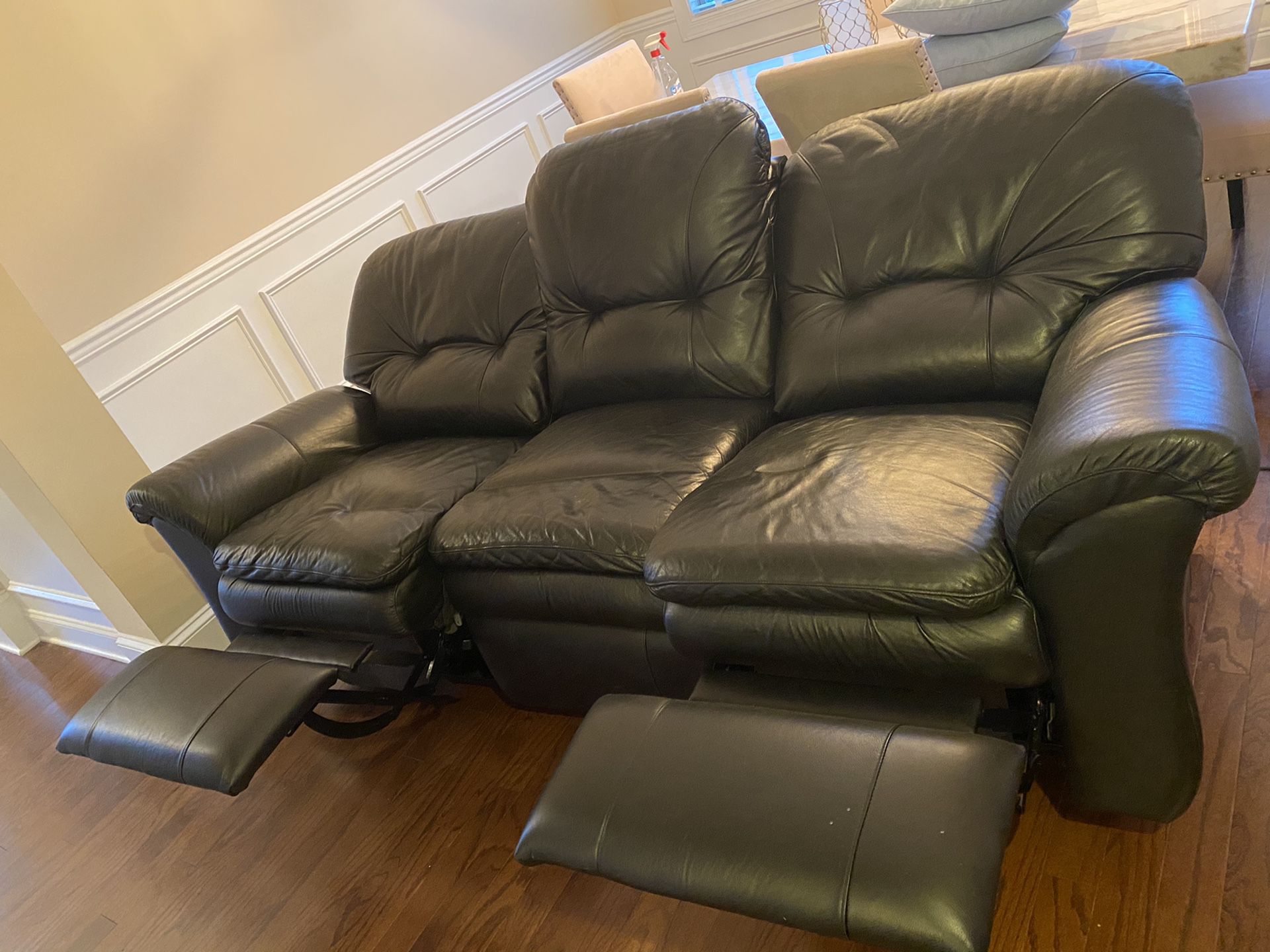 Black genuine leather couch for sale!